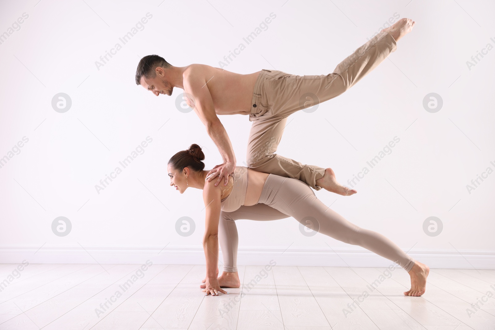 Photo of Couple of professional dancers training in studio