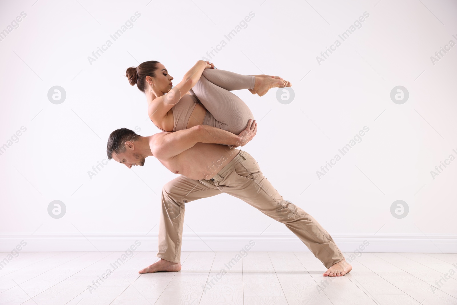 Photo of Couple of professional dancers training in studio