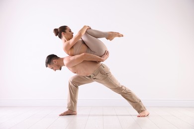 Photo of Couple of professional dancers training in studio