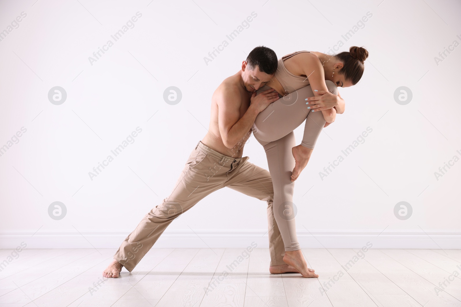 Photo of Couple of professional dancers training in studio