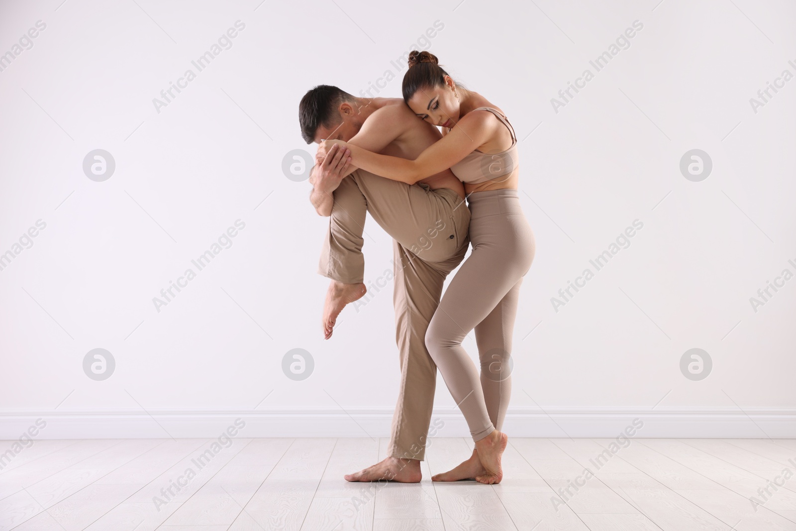 Photo of Couple of professional dancers training in studio