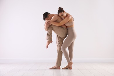 Photo of Couple of professional dancers training in studio