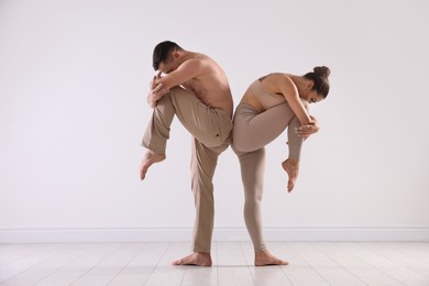 Photo of Couple of professional dancers training in studio
