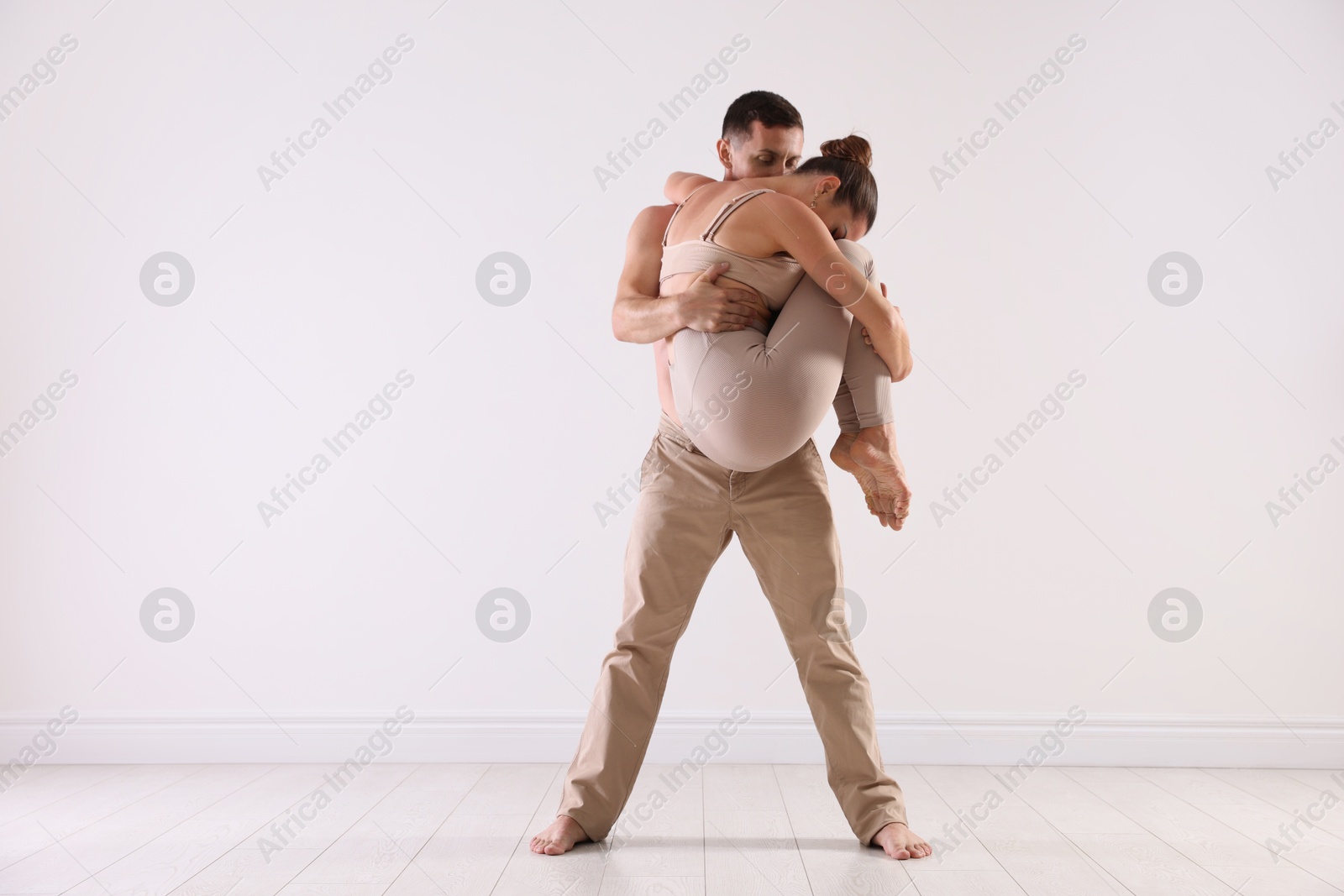 Photo of Couple of professional dancers training in studio