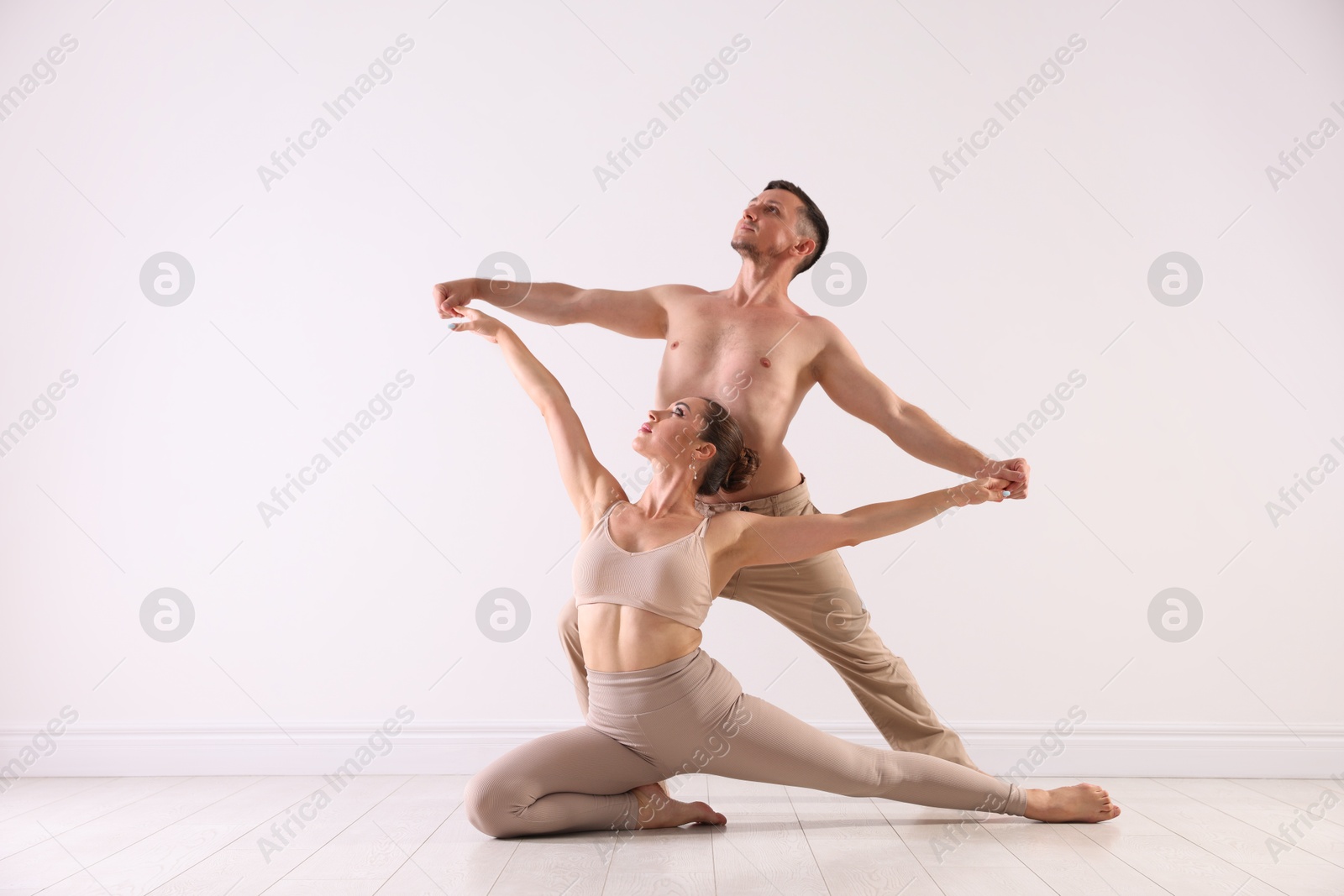 Couple of professional dancers training in studio Photo of Couple of professional dancers training in studio