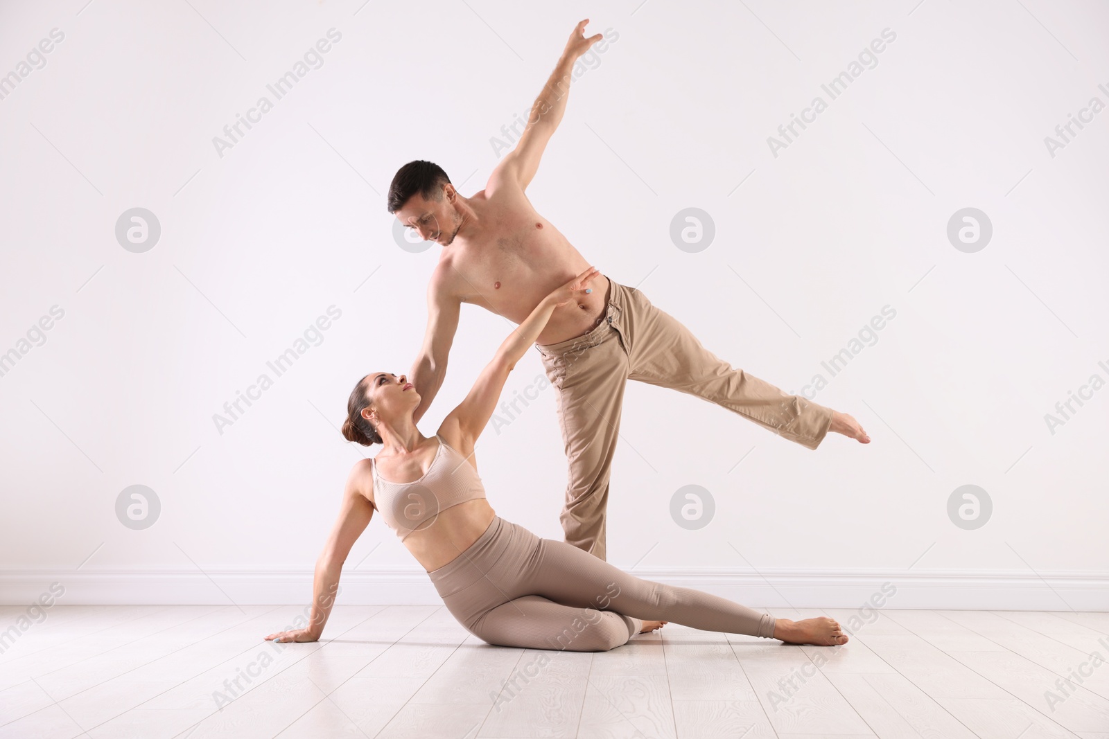 Photo of Couple of professional dancers training in studio