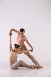Photo of Couple of professional dancers training in studio