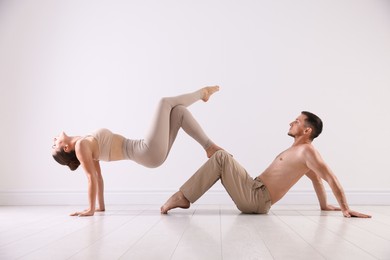 Photo of Couple of professional dancers training in studio