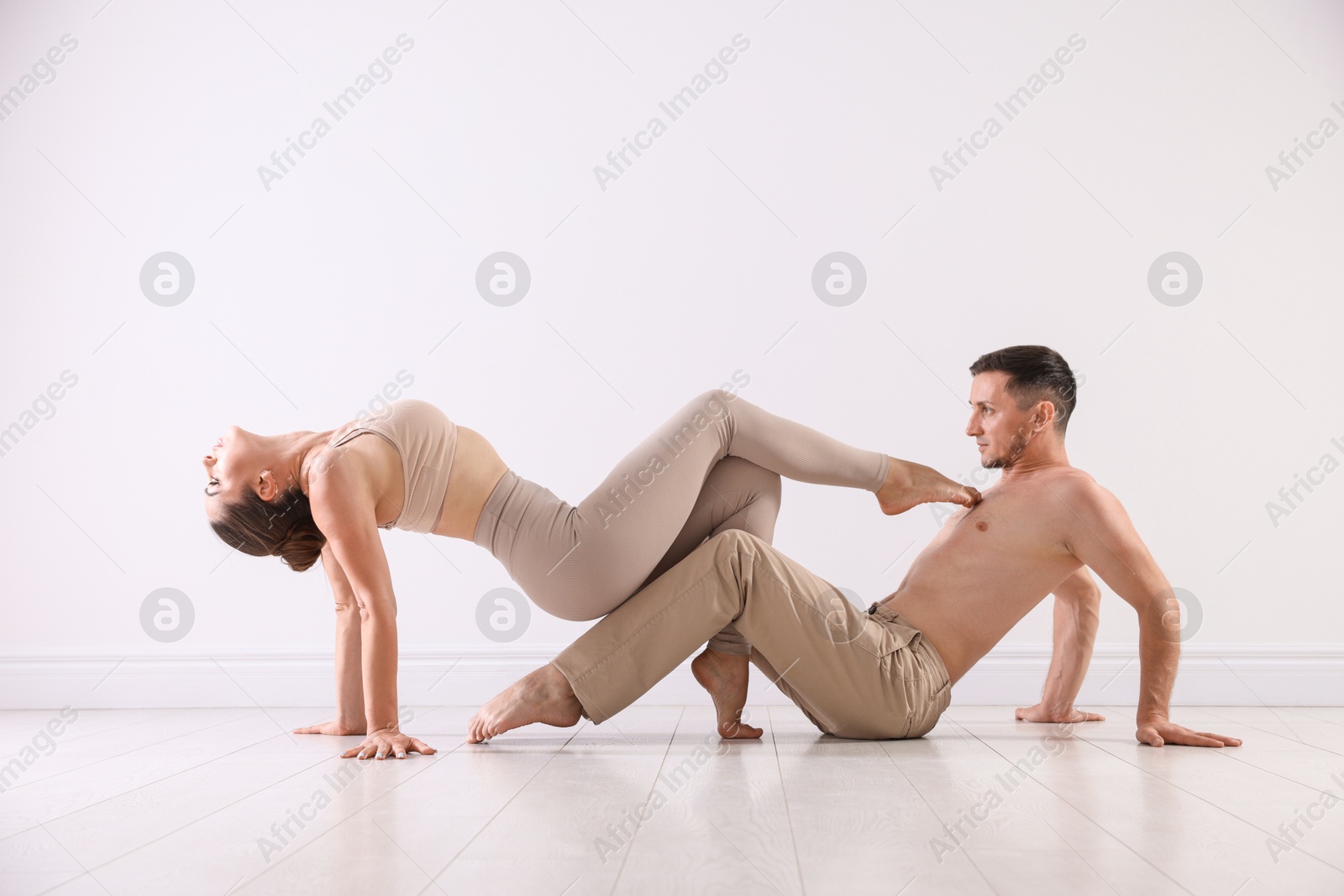 Couple of professional dancers training in studio Photo of Couple of professional dancers training in studio