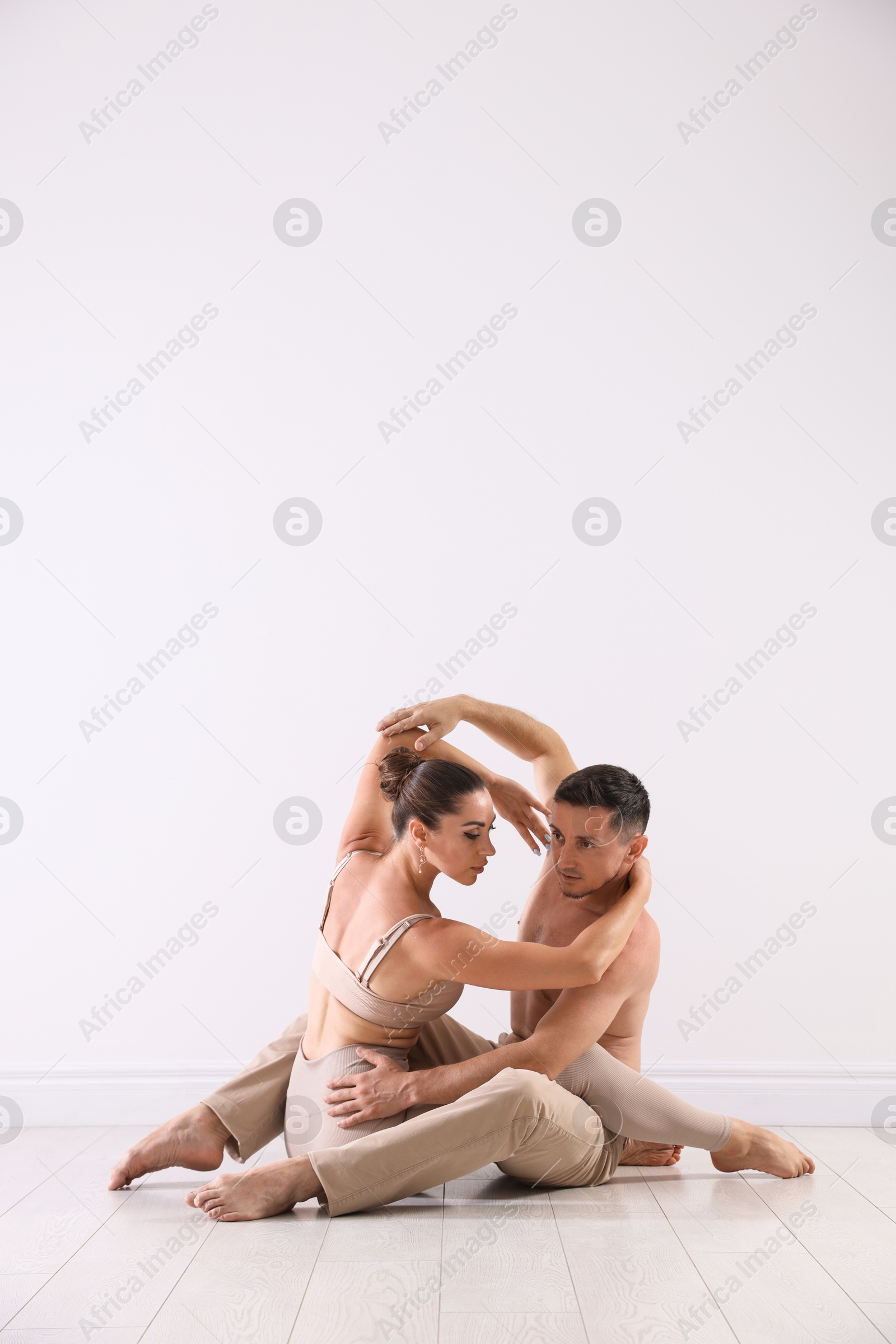 Couple of professional dancers training in studio Photo of Couple of professional dancers training in studio