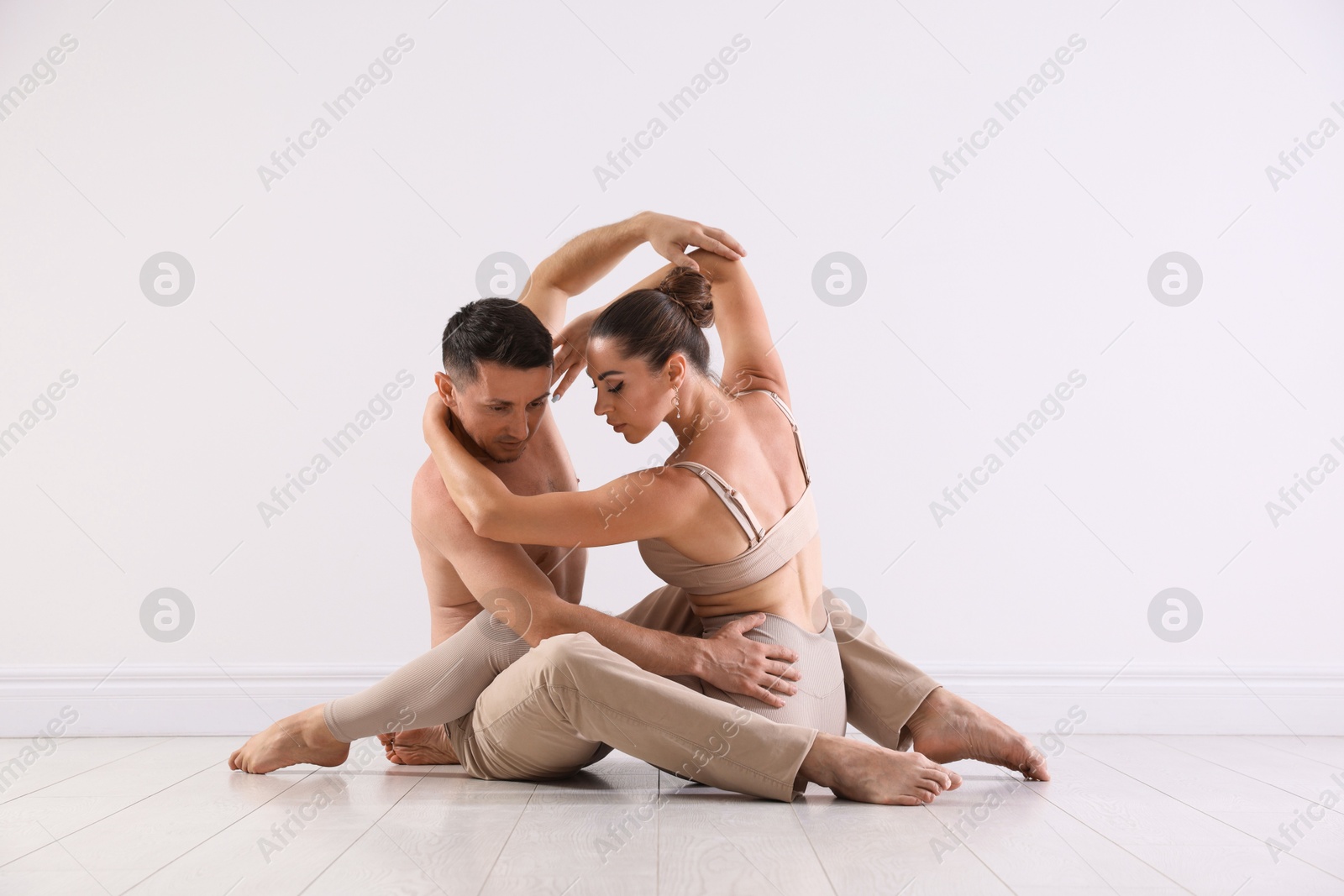 Couple of professional dancers training in studio Photo of Couple of professional dancers training in studio