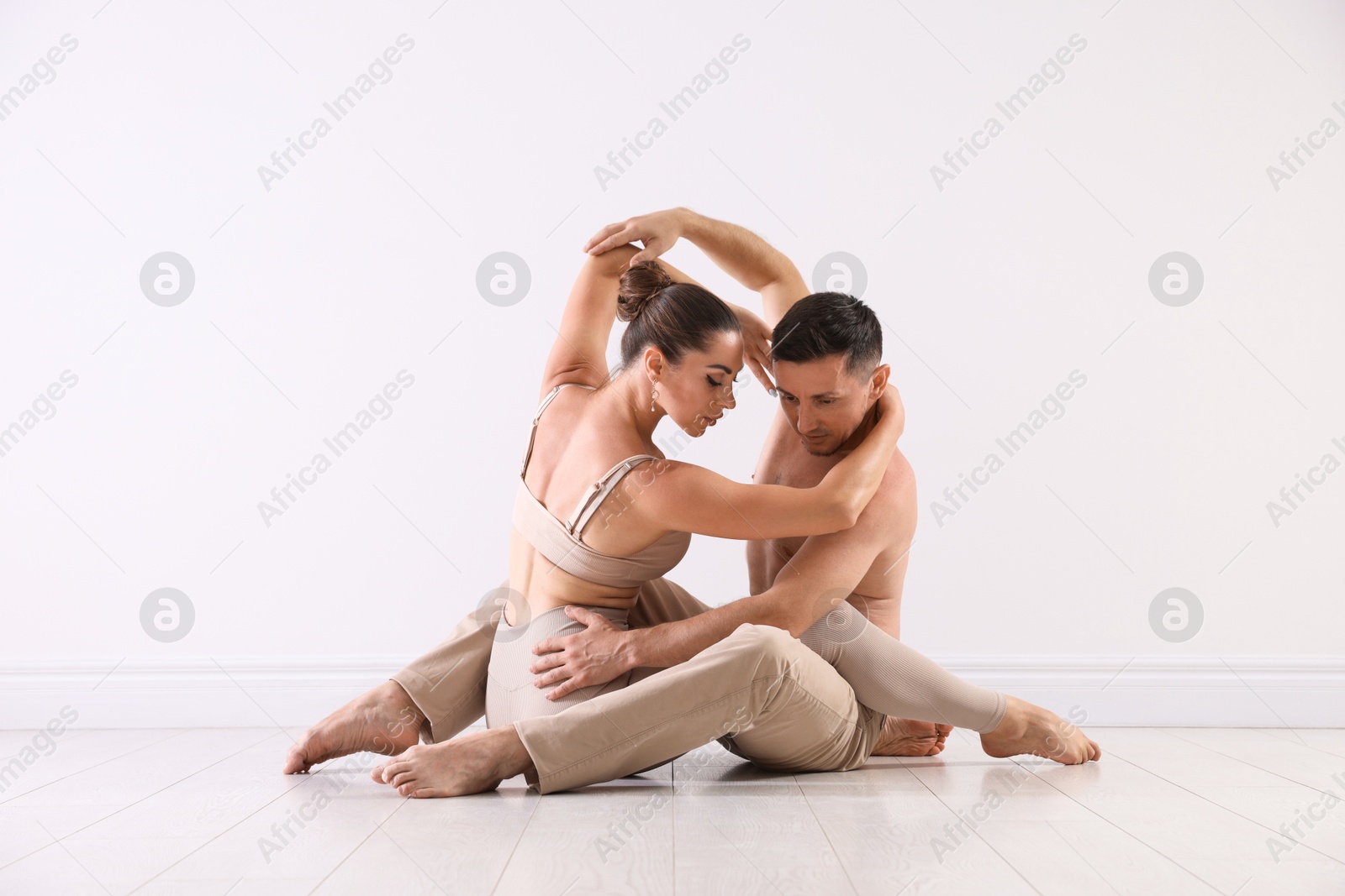 Couple of professional dancers training in studio Photo of Couple of professional dancers training in studio