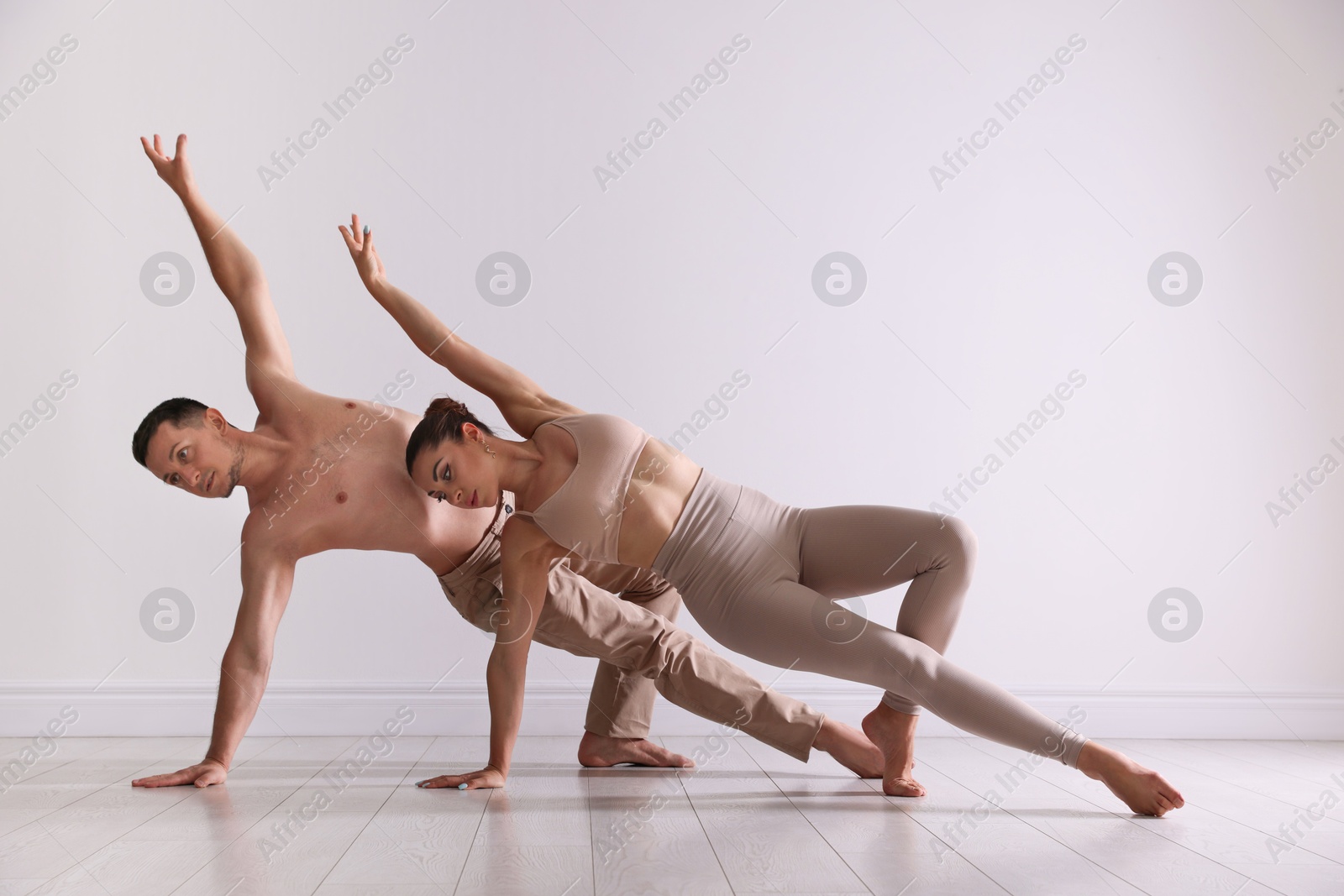 Couple of professional dancers training in studio Photo of Couple of professional dancers training in studio