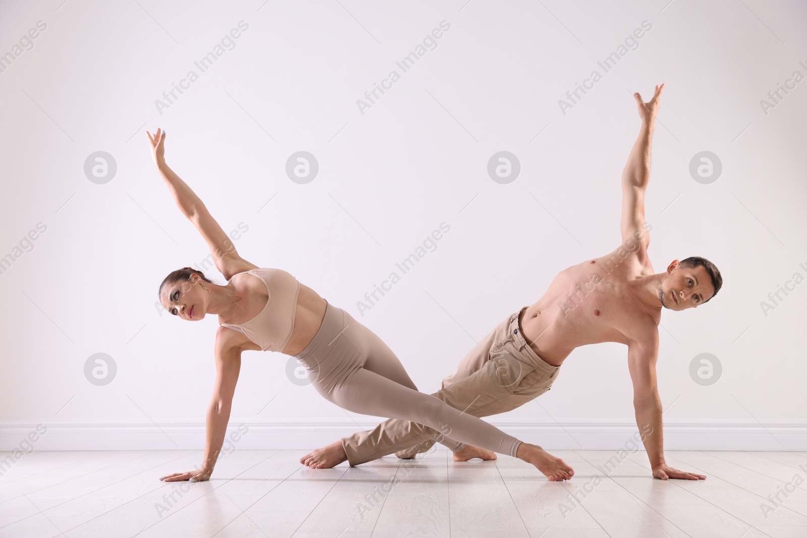 Couple of professional dancers training in studio Photo of Couple of professional dancers training in studio