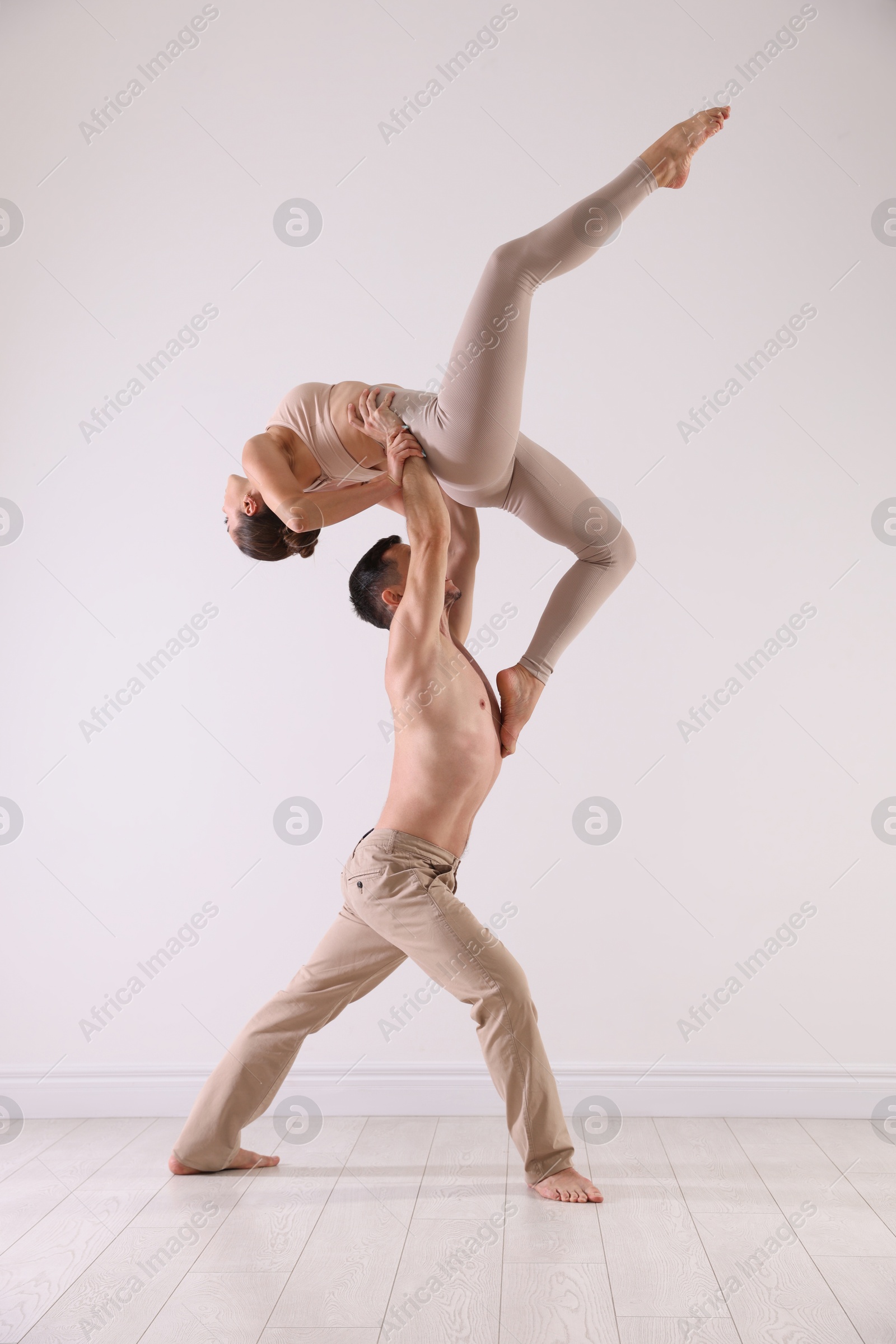 Couple of professional dancers training in studio Photo of Couple of professional dancers training in studio