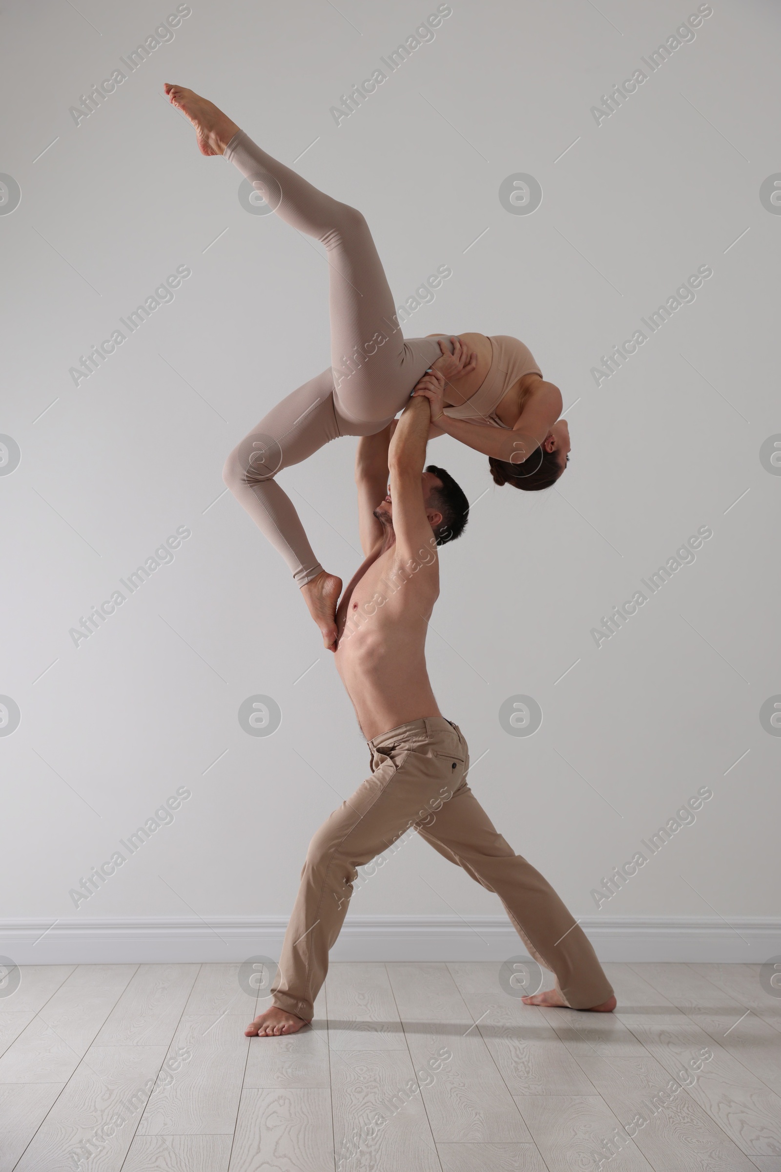 Couple of professional dancers training in studio Photo of Couple of professional dancers training in studio