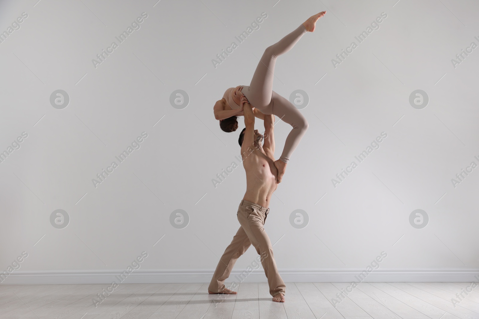 Couple of professional dancers training in studio Photo of Couple of professional dancers training in studio