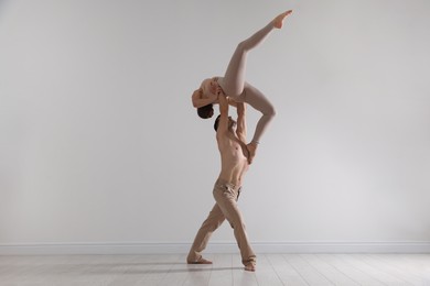 Photo of Couple of professional dancers training in studio
