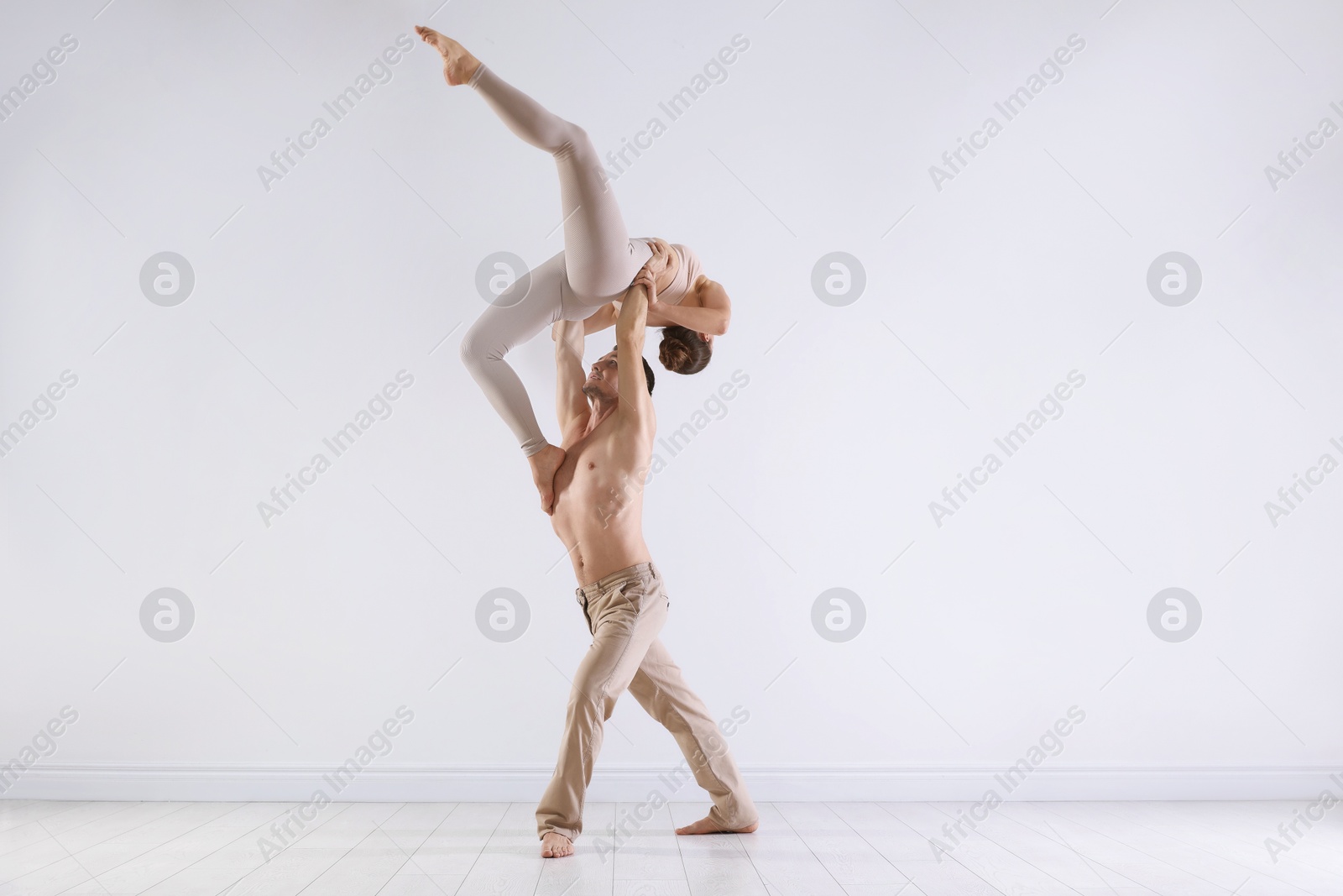 Couple of professional dancers training in studio Photo of Couple of professional dancers training in studio