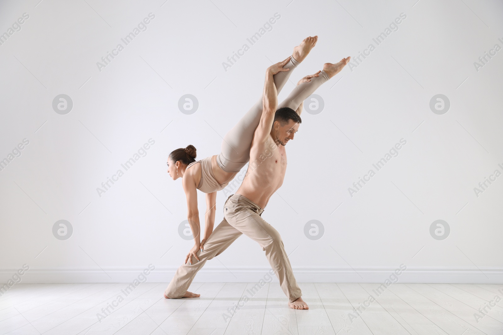 Couple of professional dancers training in studio Photo of Couple of professional dancers training in studio