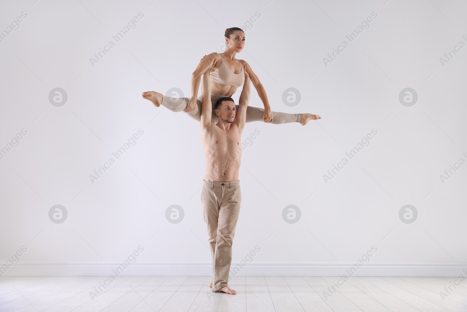 Couple of professional dancers training in studio Photo of Couple of professional dancers training in studio