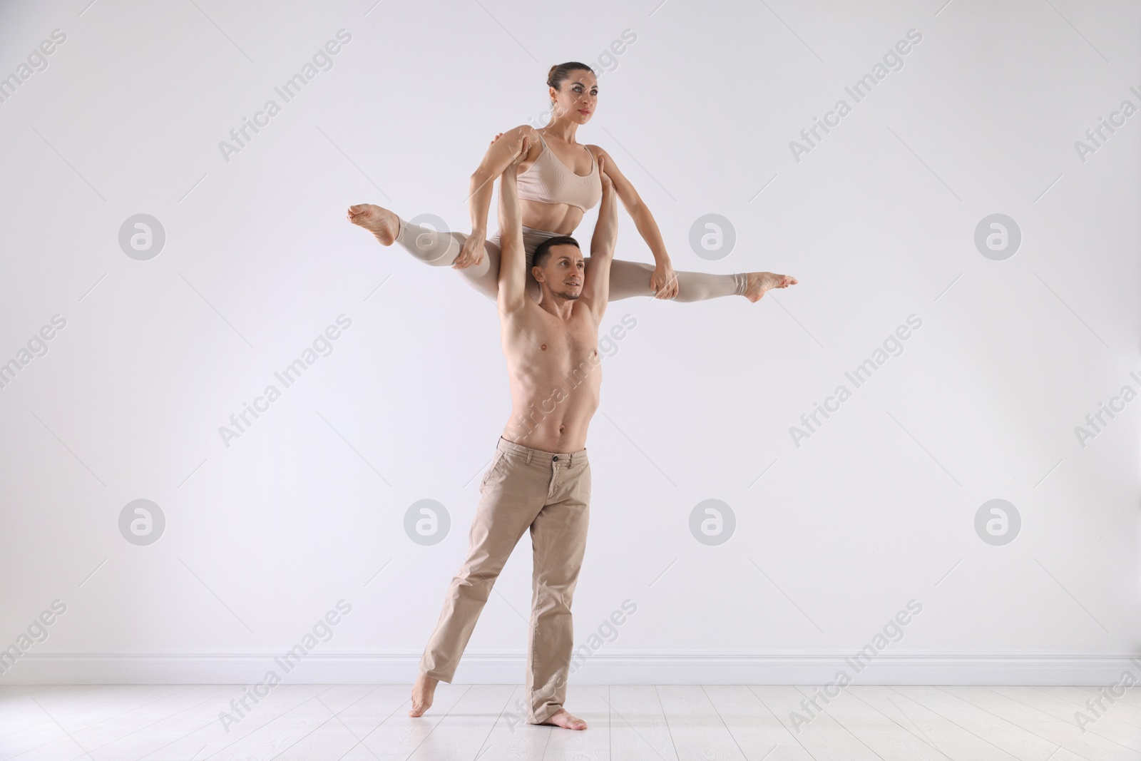 Couple of professional dancers training in studio Photo of Couple of professional dancers training in studio