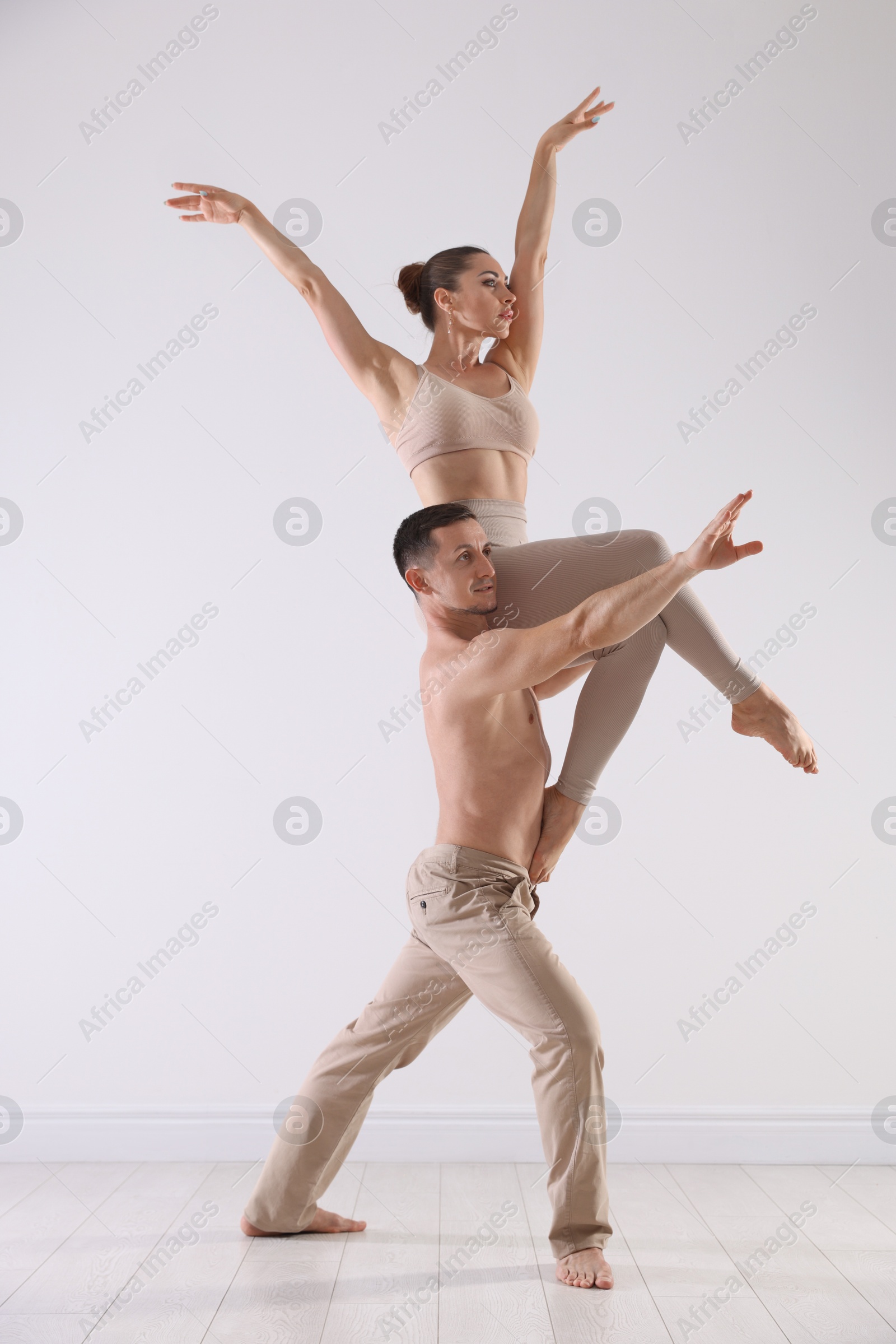 Couple of professional dancers training in studio Photo of Couple of professional dancers training in studio
