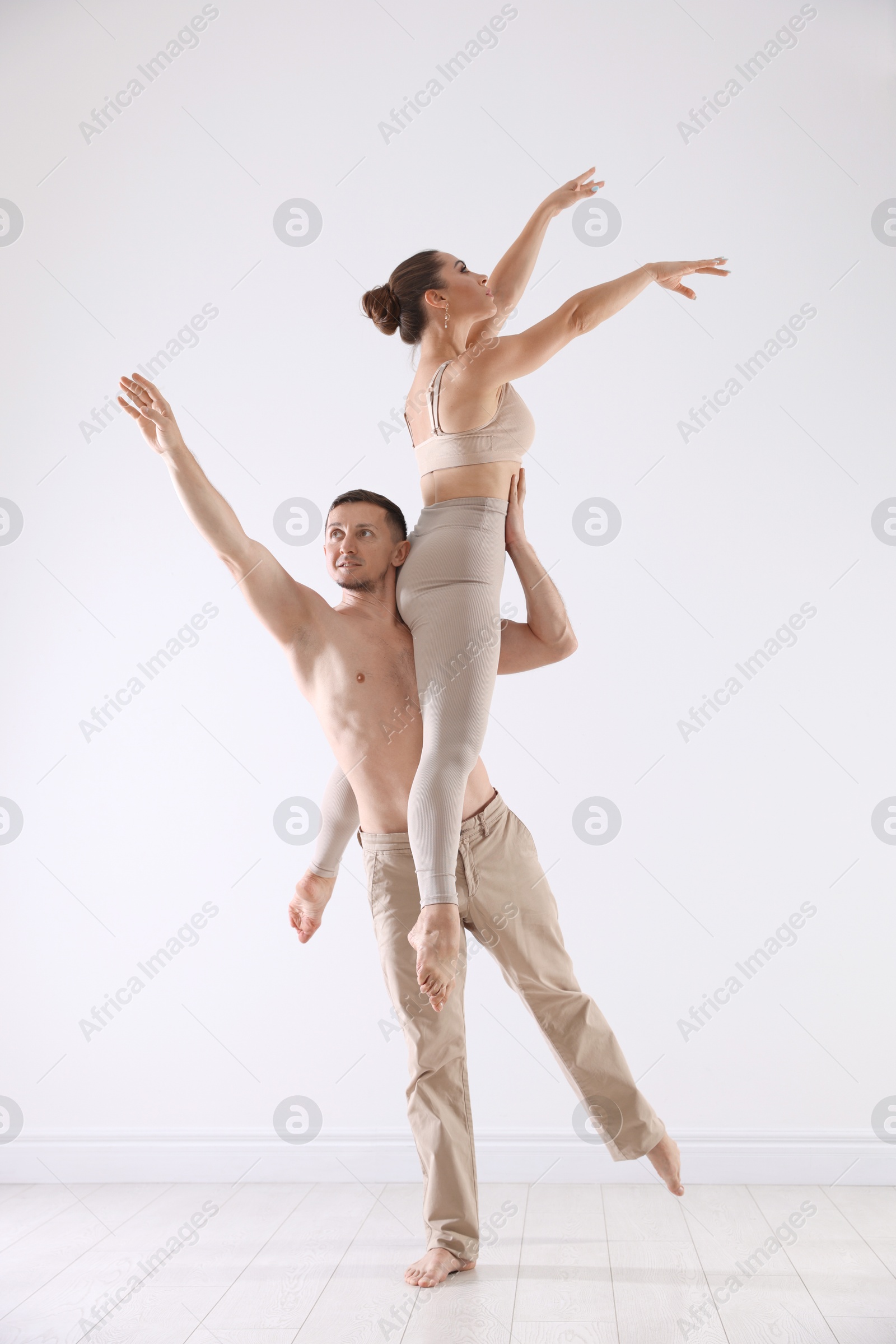Couple of professional dancers training in studio Photo of Couple of professional dancers training in studio