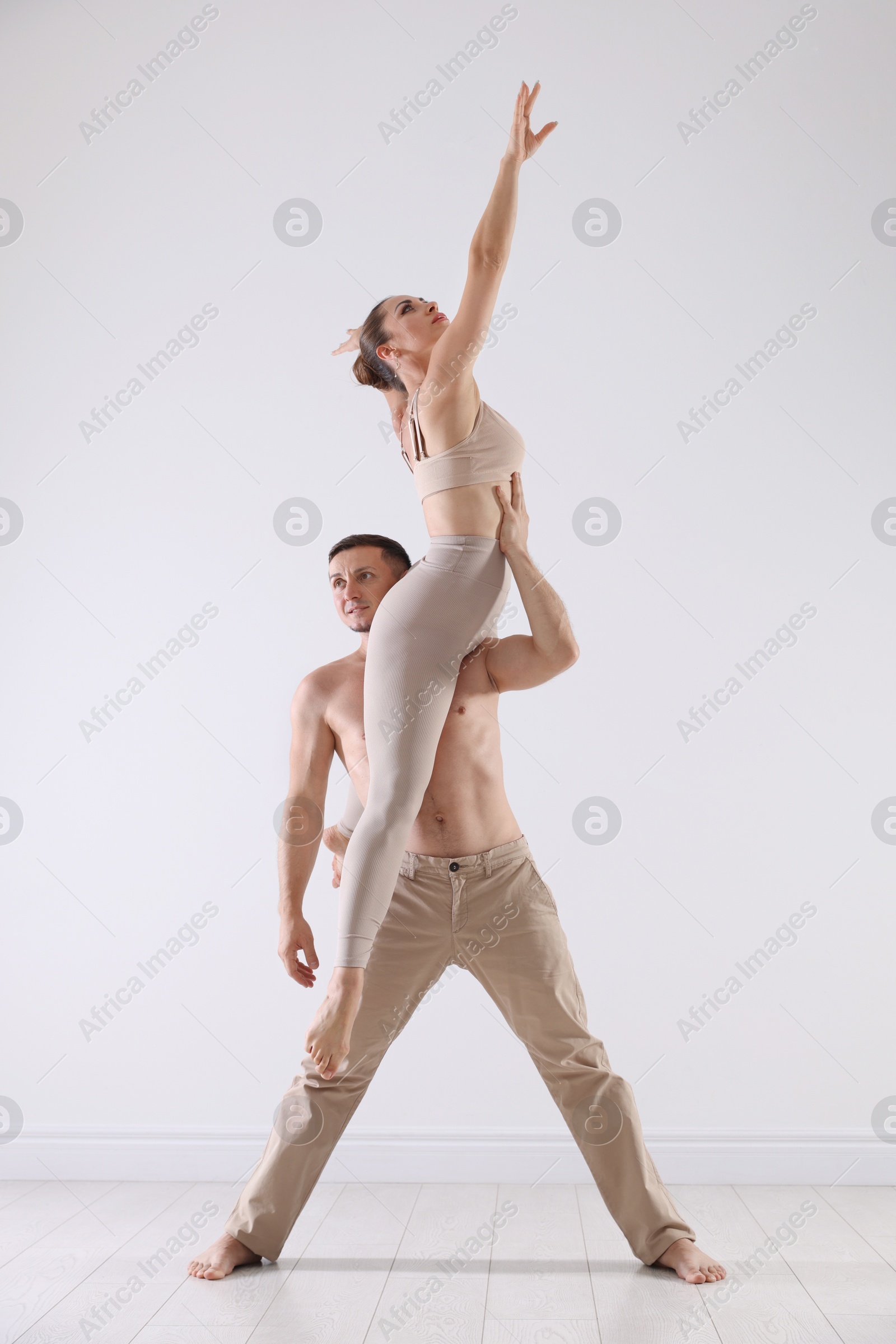 Couple of professional dancers training in studio Photo of Couple of professional dancers training in studio