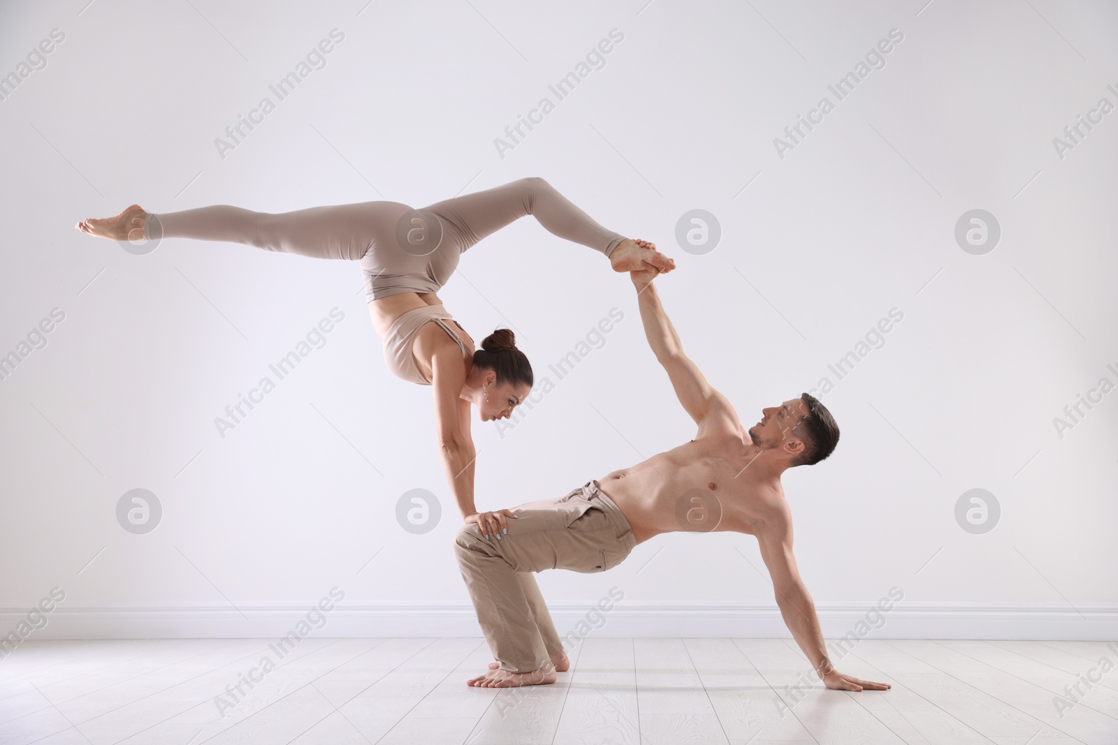 Couple of professional dancers training in studio Photo of Couple of professional dancers training in studio
