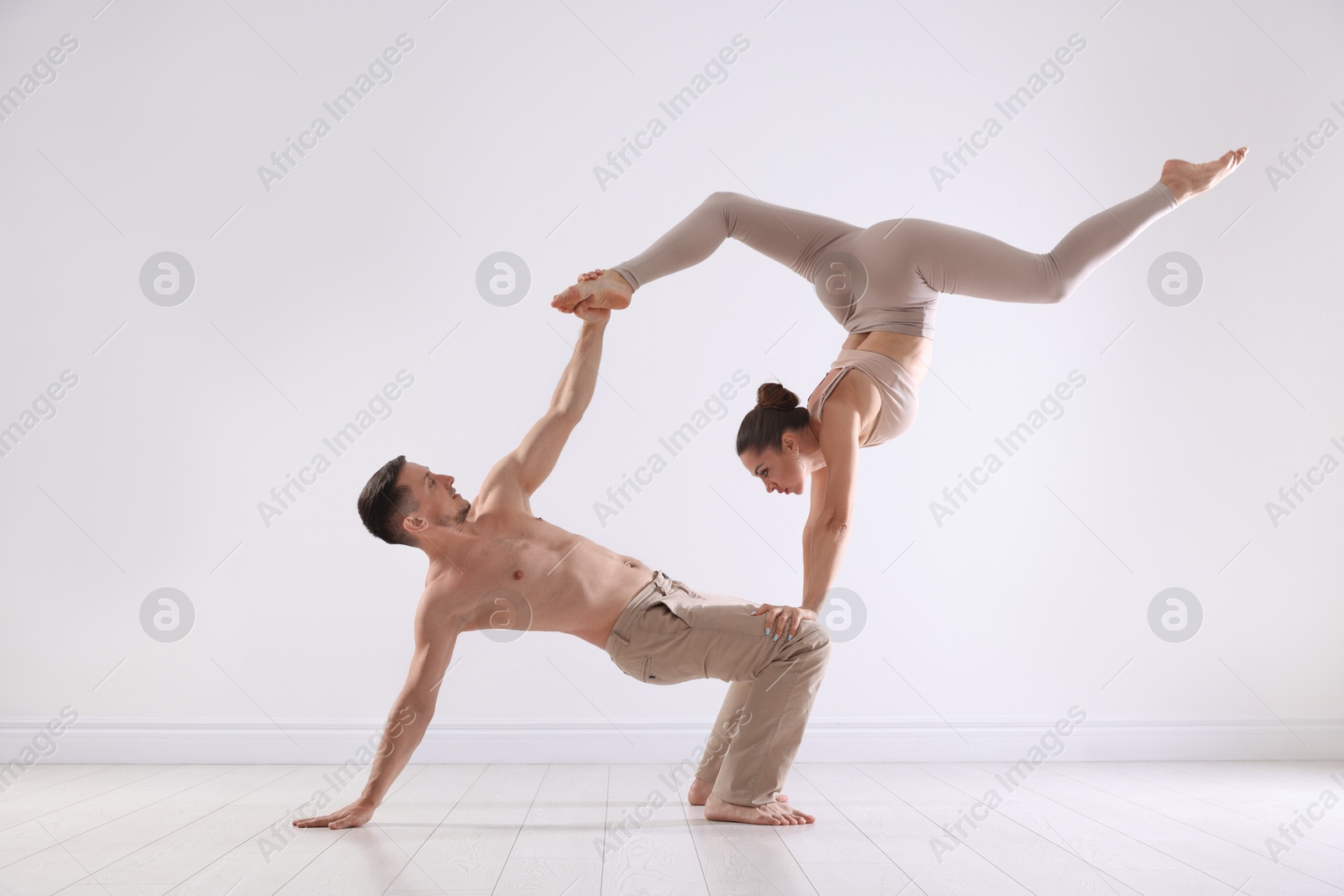 Couple of professional dancers training in studio Photo of Couple of professional dancers training in studio
