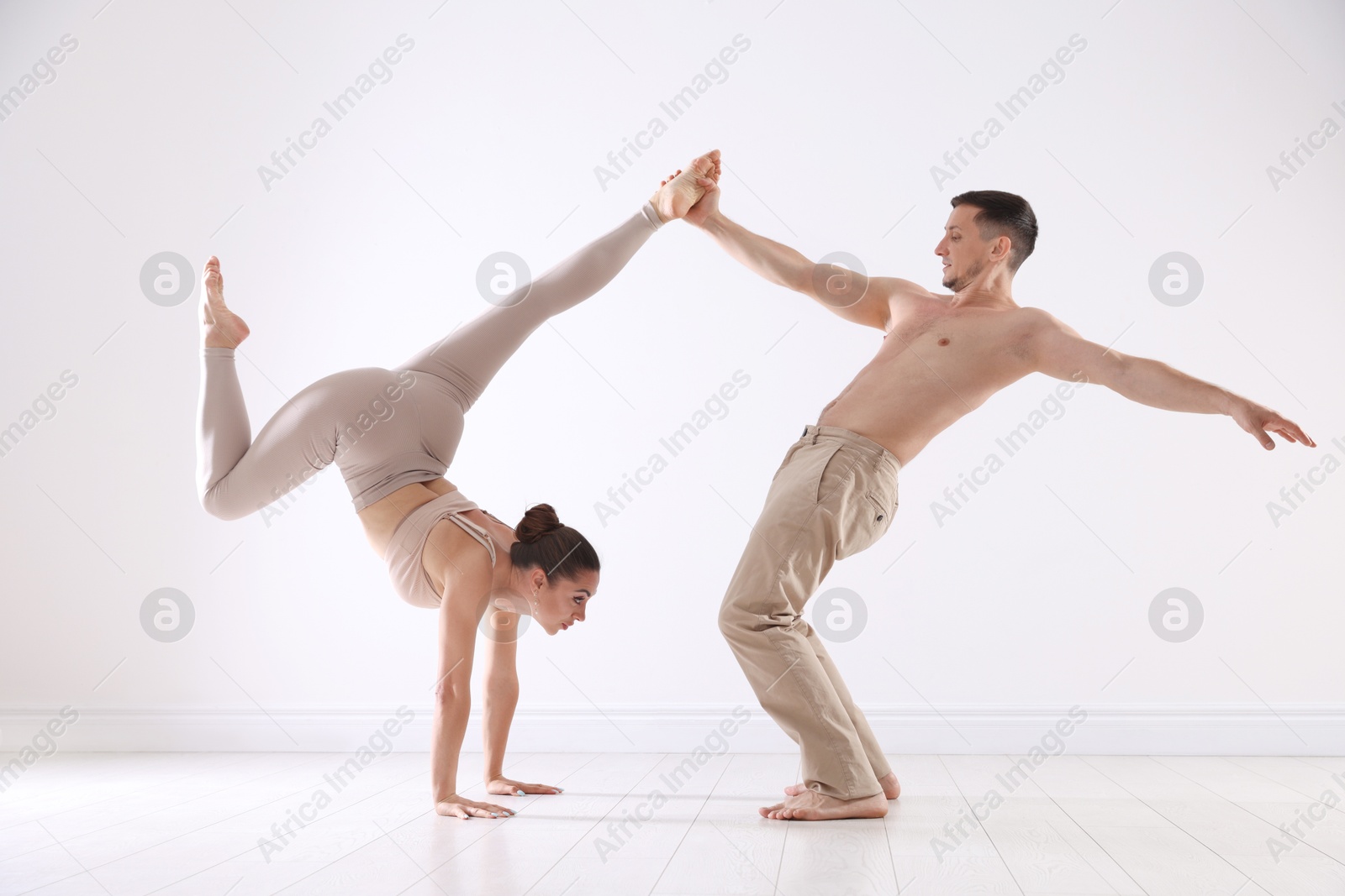 Couple of professional dancers training in studio Photo of Couple of professional dancers training in studio