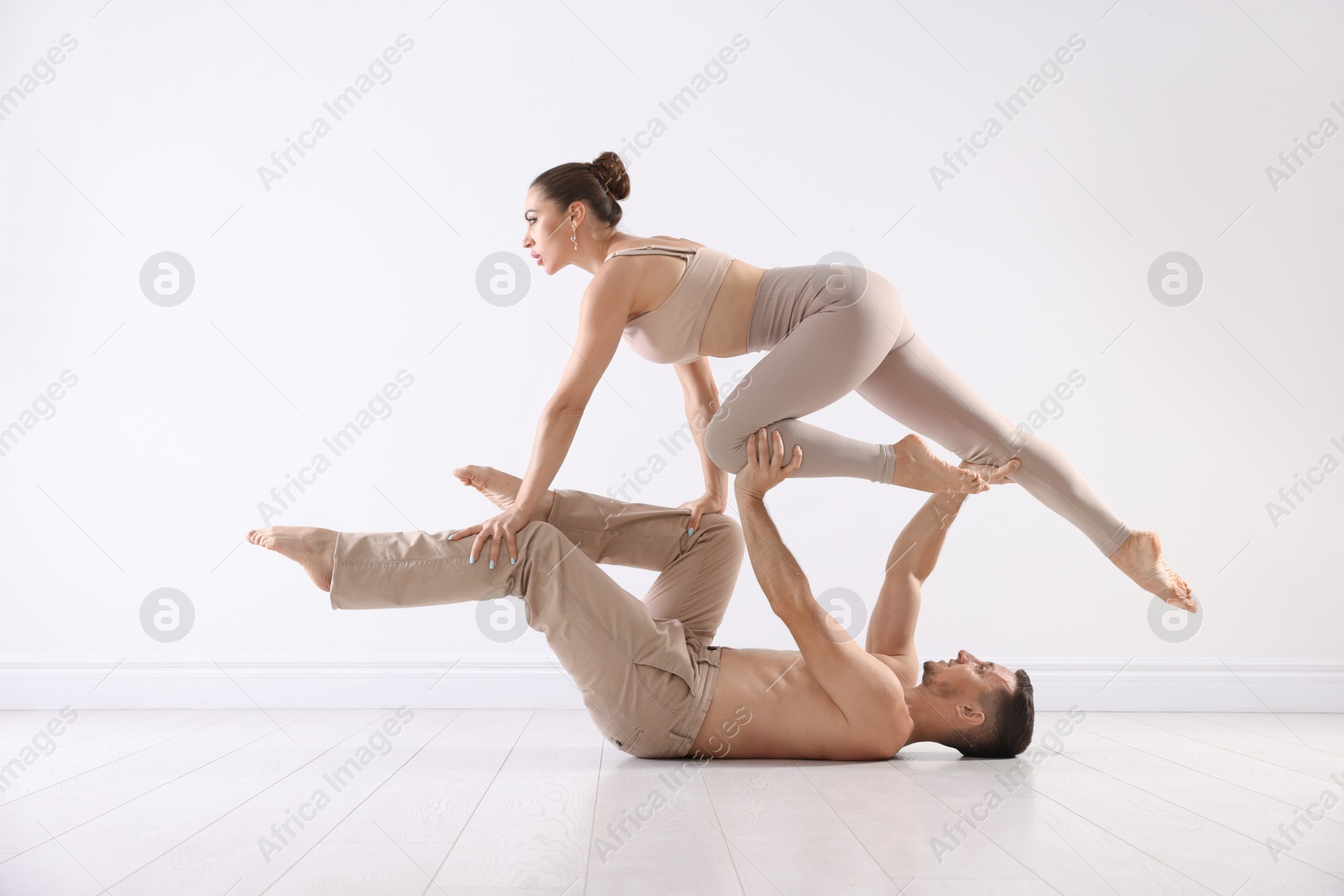 Couple of professional dancers training in studio Photo of Couple of professional dancers training in studio