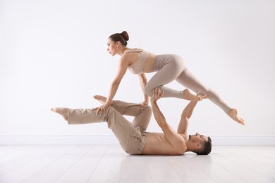 Photo of Couple of professional dancers training in studio