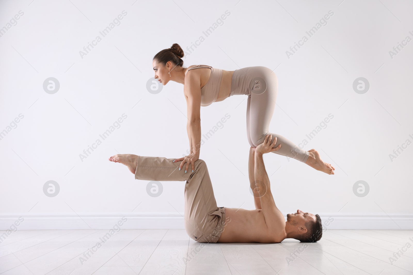 Couple of professional dancers training in studio Photo of Couple of professional dancers training in studio