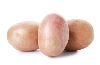 Photo of Many fresh ripe potatoes isolated on white
