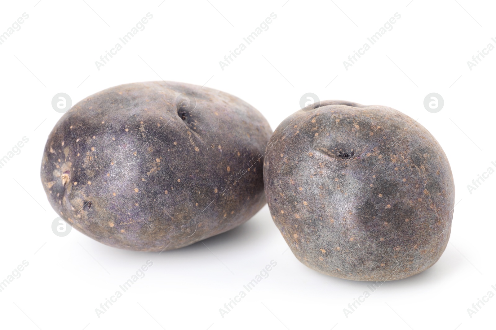 Photo of Fresh ripe purple potatoes isolated on white