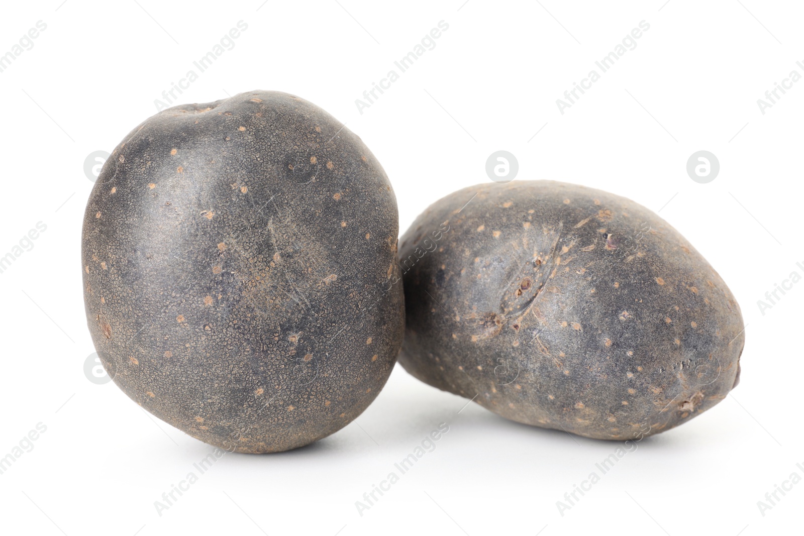 Photo of Fresh ripe purple potatoes isolated on white