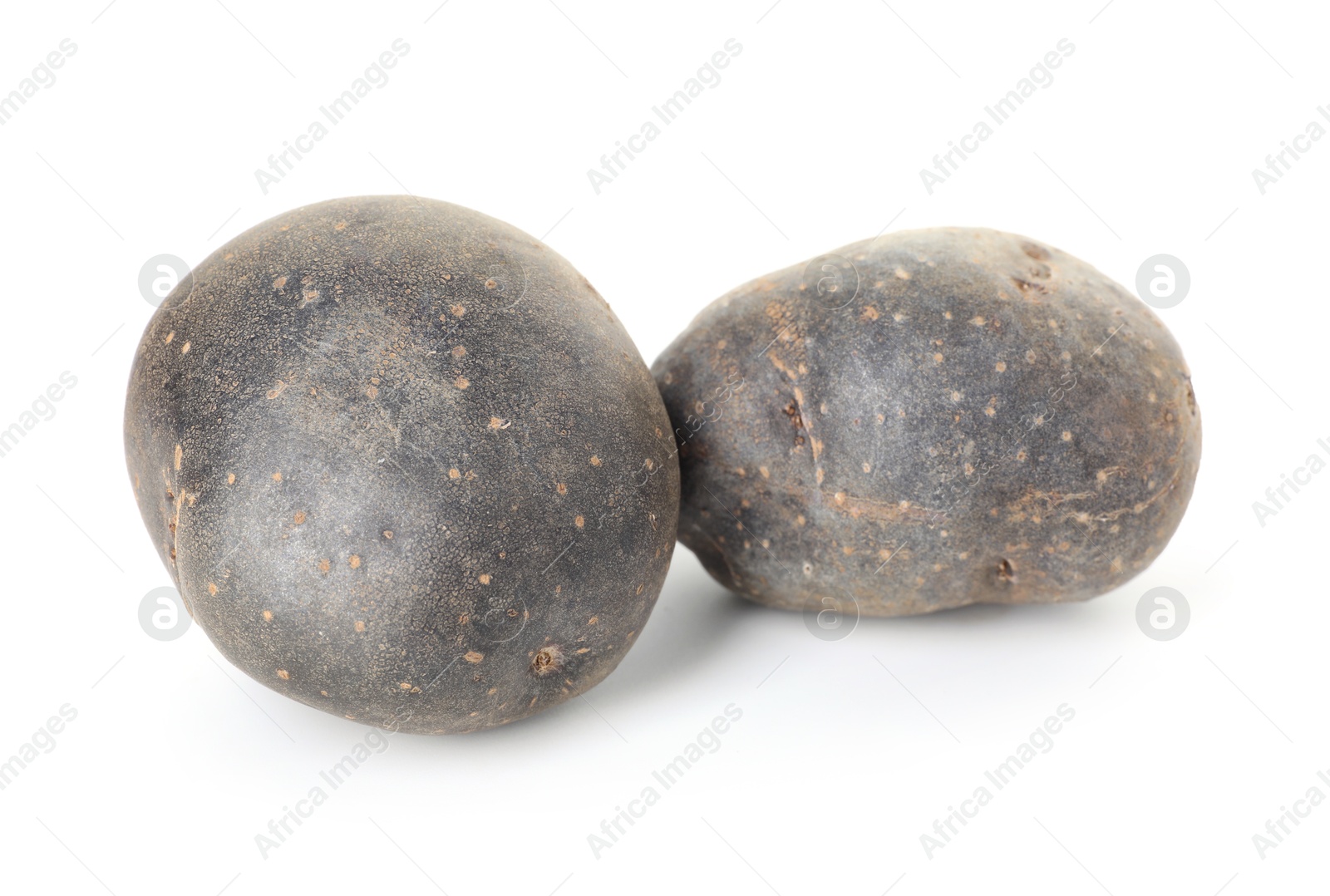 Photo of Fresh ripe purple potatoes isolated on white