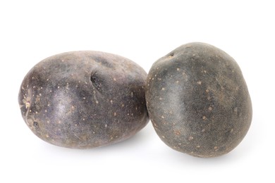 Photo of Fresh ripe purple potatoes isolated on white
