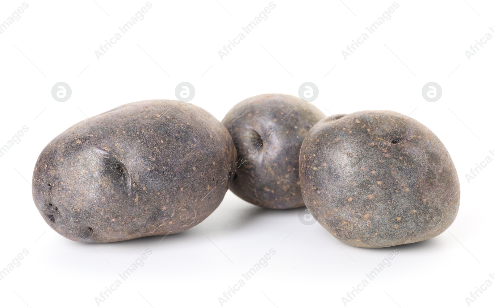 Photo of Fresh ripe purple potatoes isolated on white