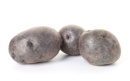 Photo of Fresh ripe purple potatoes isolated on white