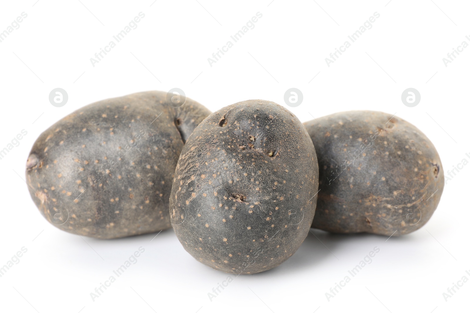 Photo of Fresh ripe purple potatoes isolated on white