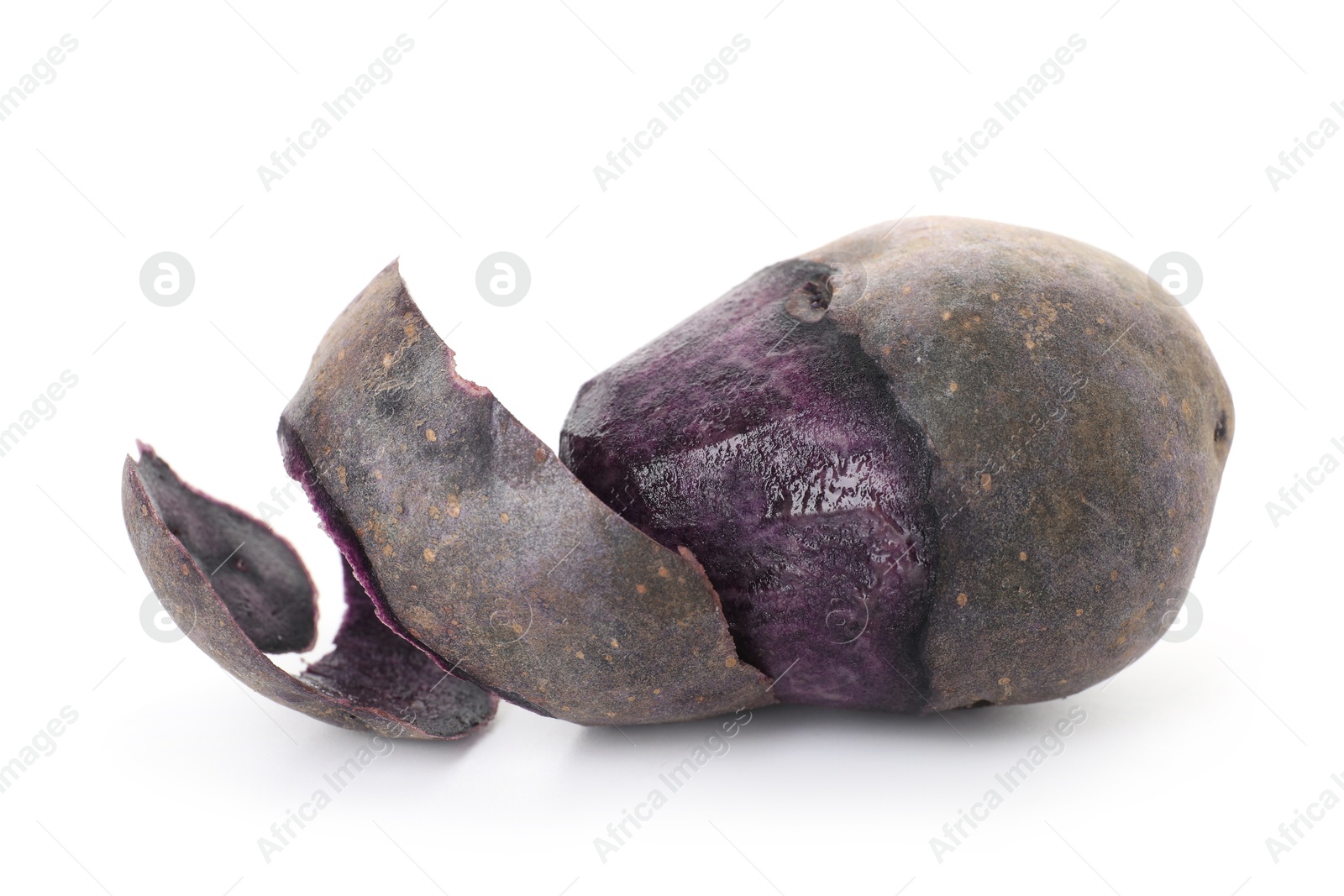 Photo of Raw purple potato with peel isolated on white