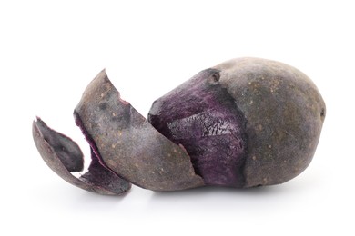 Photo of Raw purple potato with peel isolated on white