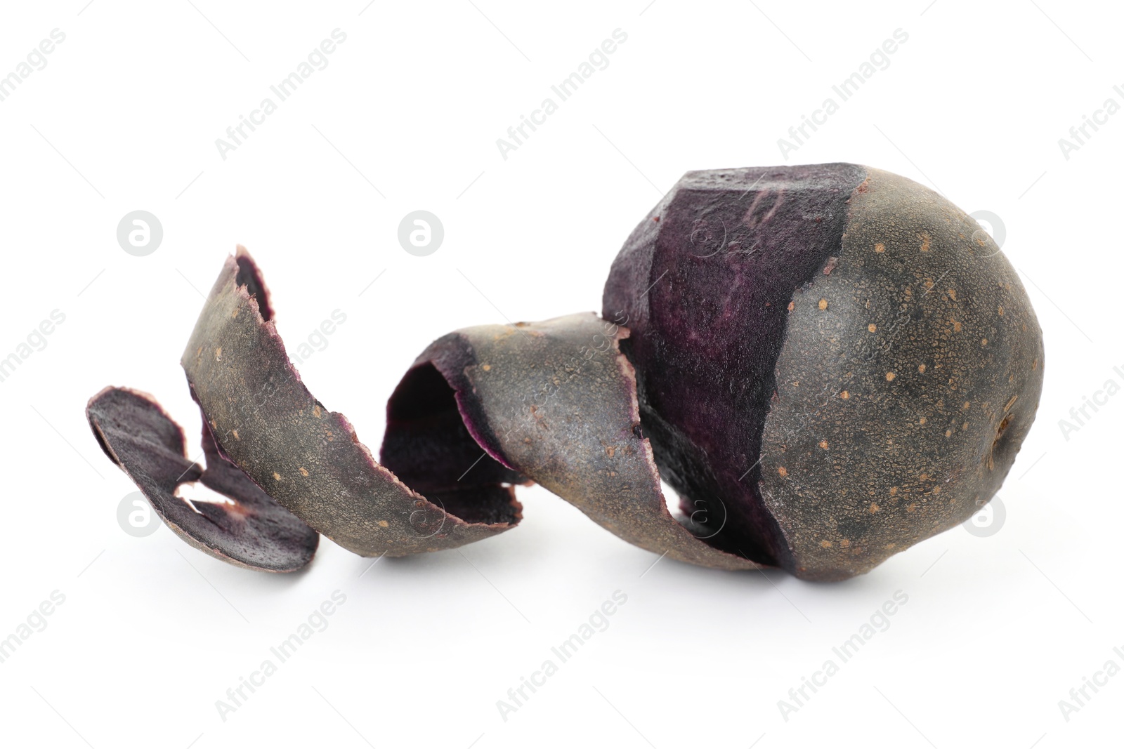 Raw purple potato with peel isolated on white Photo of Raw purple potato with peel isolated on white