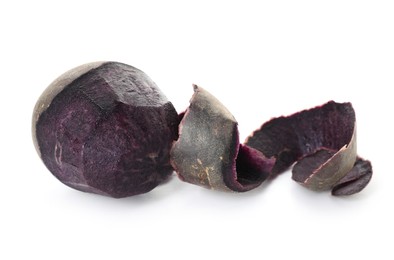 Photo of Raw purple potato with peel isolated on white