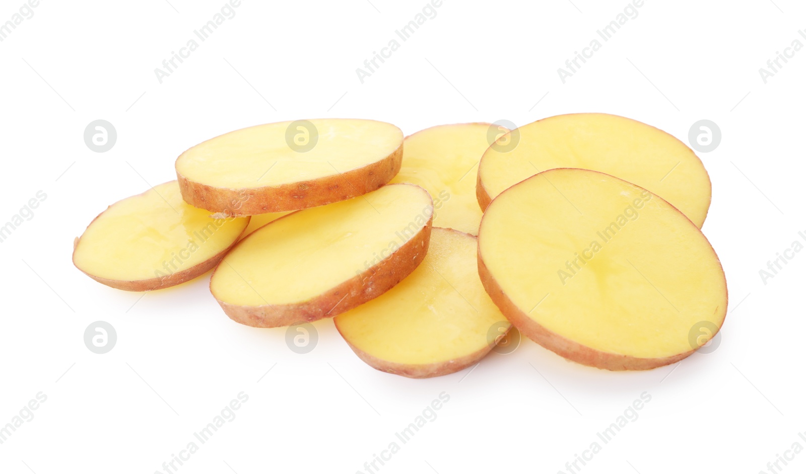 Pieces of fresh potatoes isolated on white Photo of Pieces of fresh potatoes isolated on white