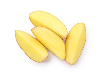 Photo of Pieces of fresh potatoes isolated on white, top view