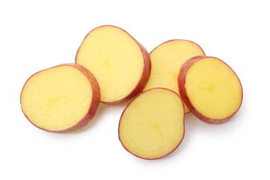 Photo of Pieces of fresh red potatoes isolated on white, top view
